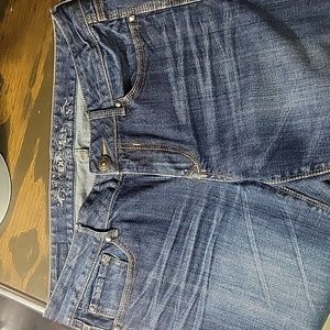 Express jeans size 10 Regular medium to dark wash.